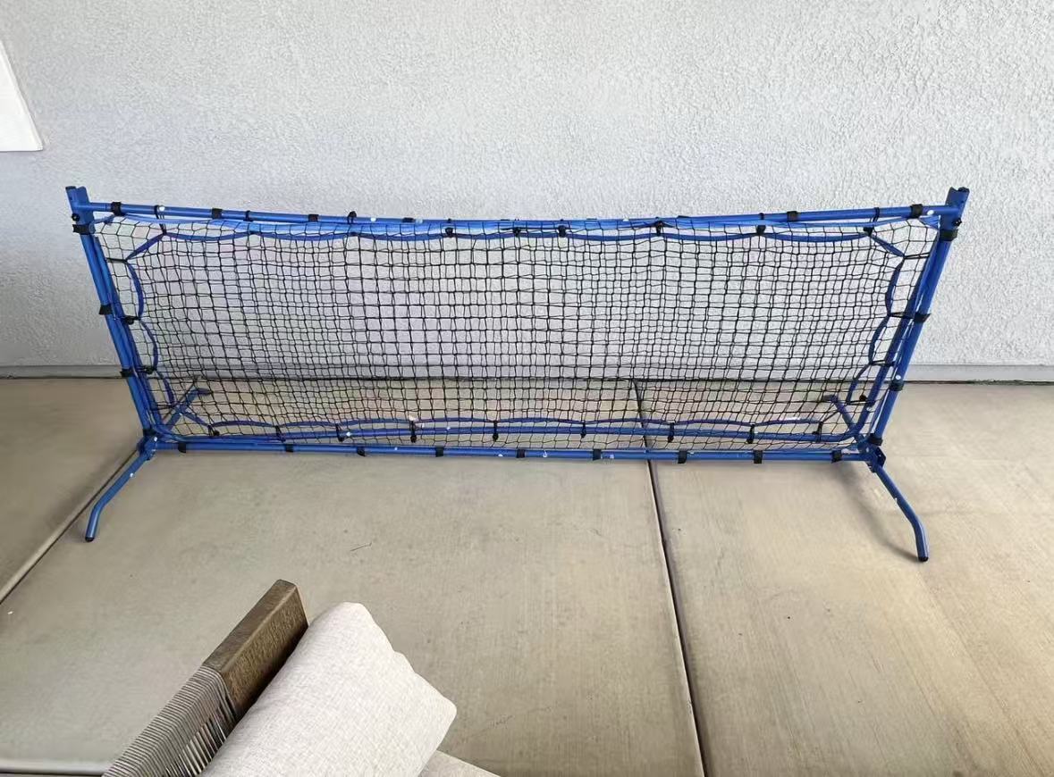 Pickleball net with bounce back option